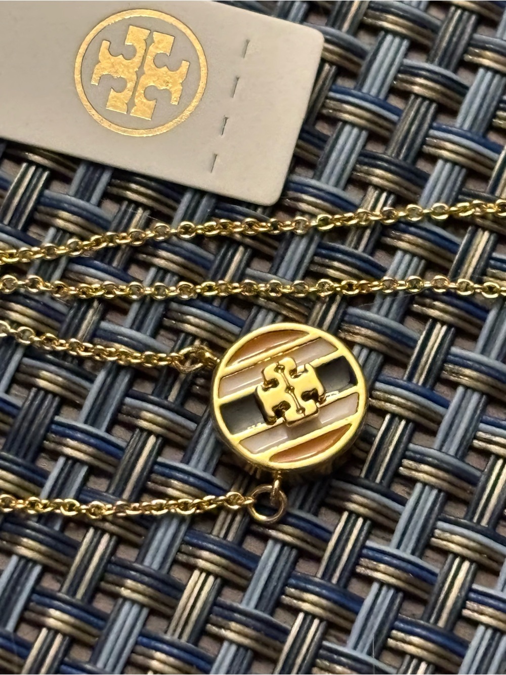 Tory Burch Gold-Tone Logo Disc Necklace with Black Enamel Stripes, brand new